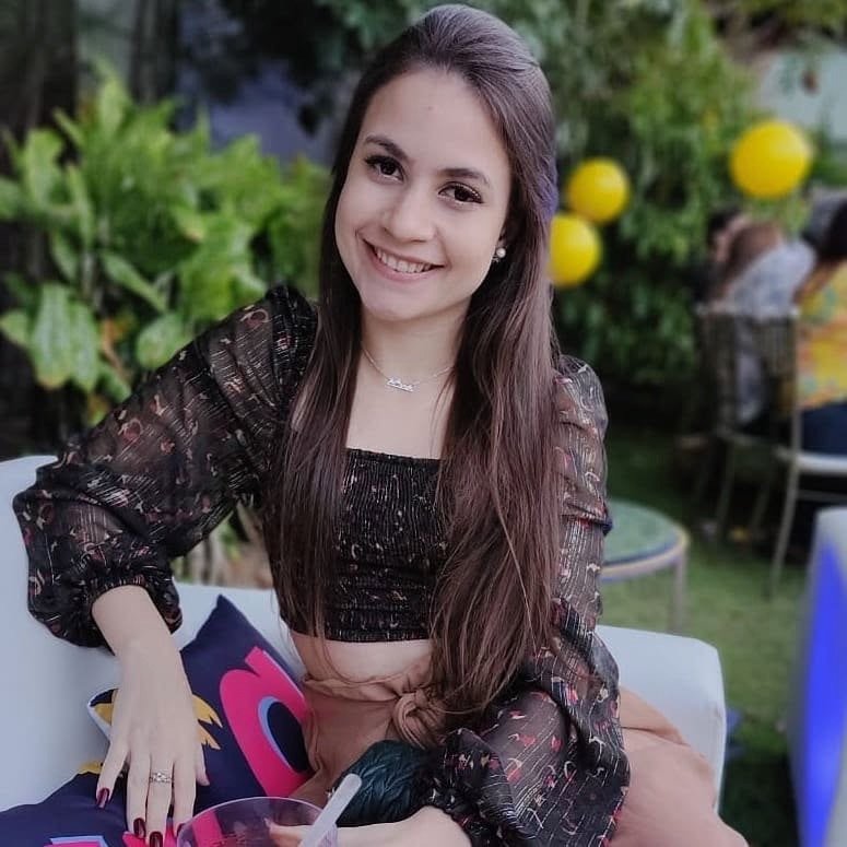A young girl named anita sitting down
